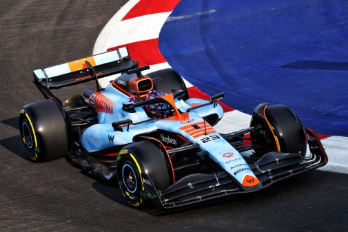 2020's race car taking a corner on a track